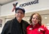 A veteran poses in the Exchange mall with an Exchange associate.